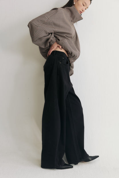 Side view of Structured horseshoe jeans in washed black cotton denim