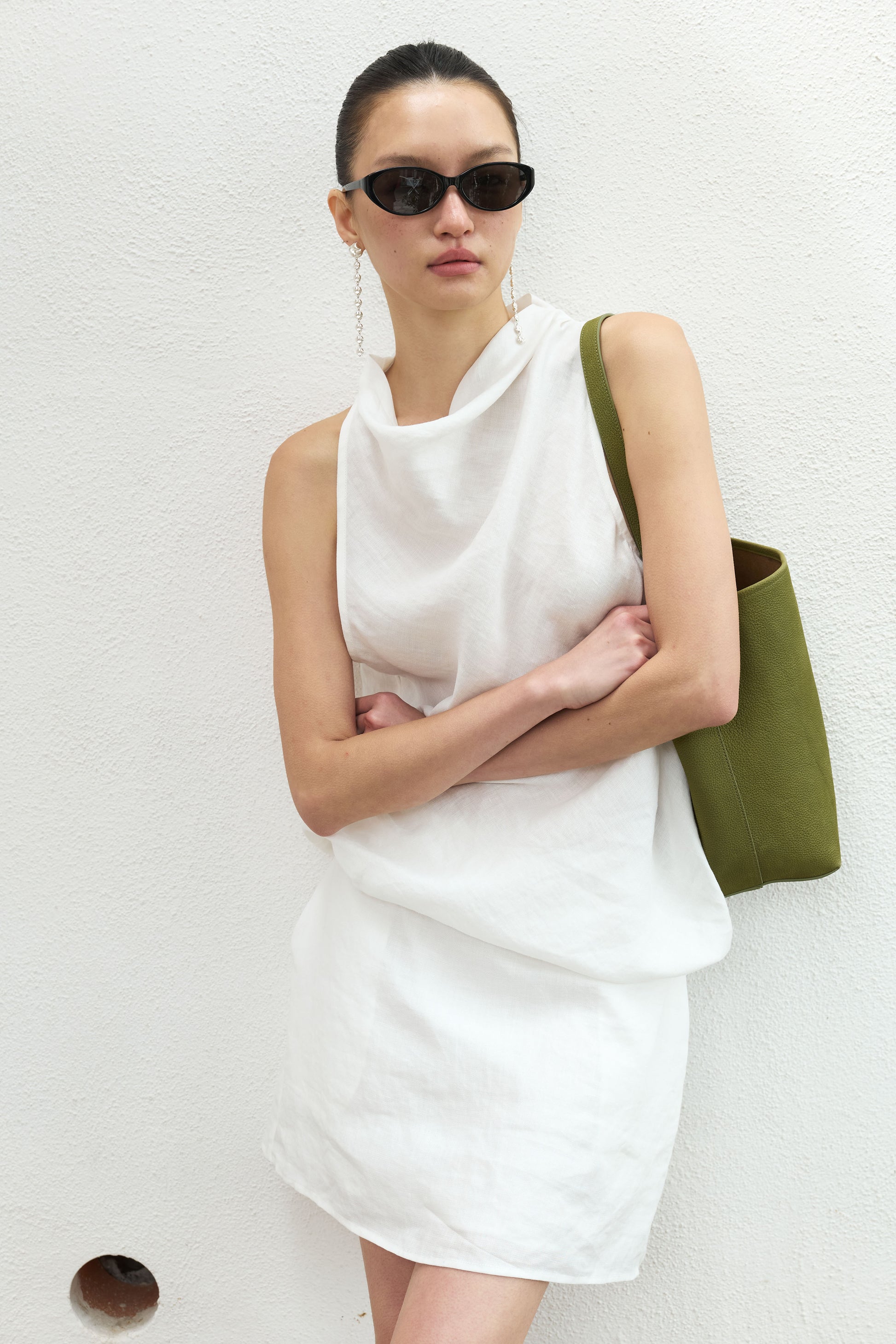 SLO Classic 001 minimalist sunglasses styled for everyday wear